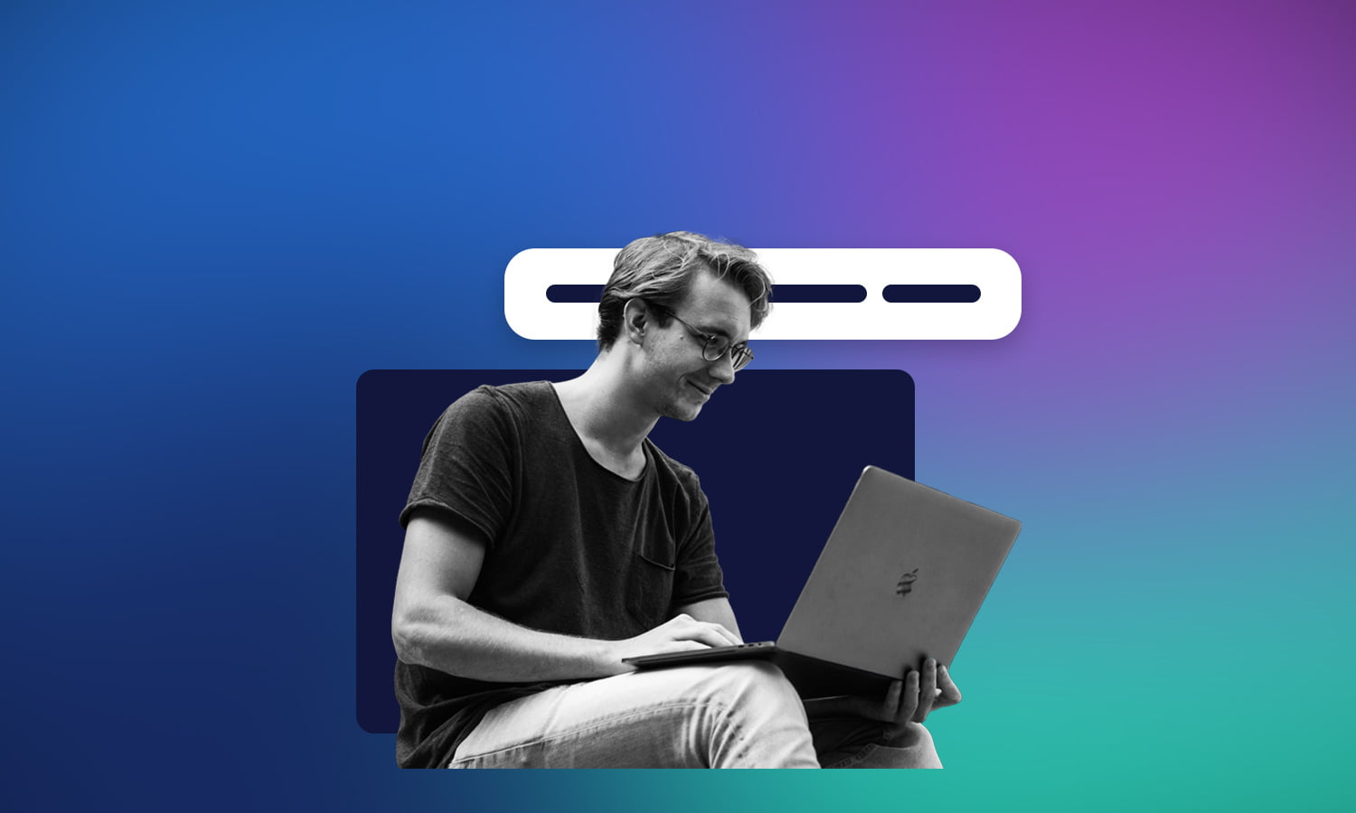 Young male on computer in front of gradient background